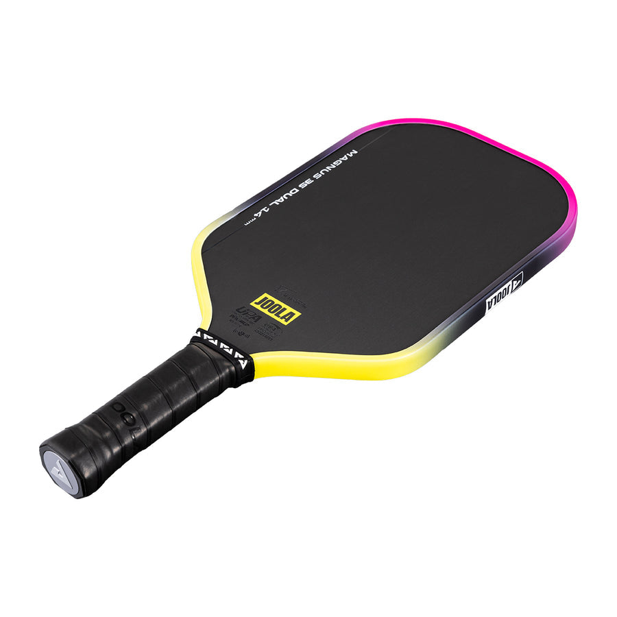 The JOOLA Magnus 3S Dual 14mm Pickleball Paddle, black with a yellow-pink gradient edge and JOOLA logo by the handle, is displayed on a white background.