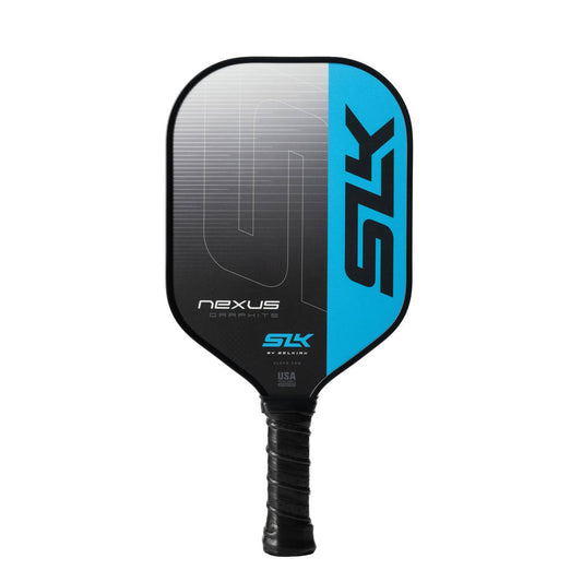 A black and blue Pickleballist SLK Nexus Blue Pickleball Paddle with branding on the front, isolated on a white background.