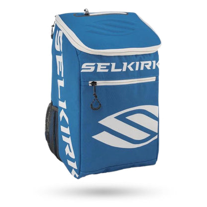 Blue and black Pickleballist branded Selkirk Team Backpack (2021) pickleball bag with zipper, protected laptop sleeve, and side mesh pocket, isolated on a white background.