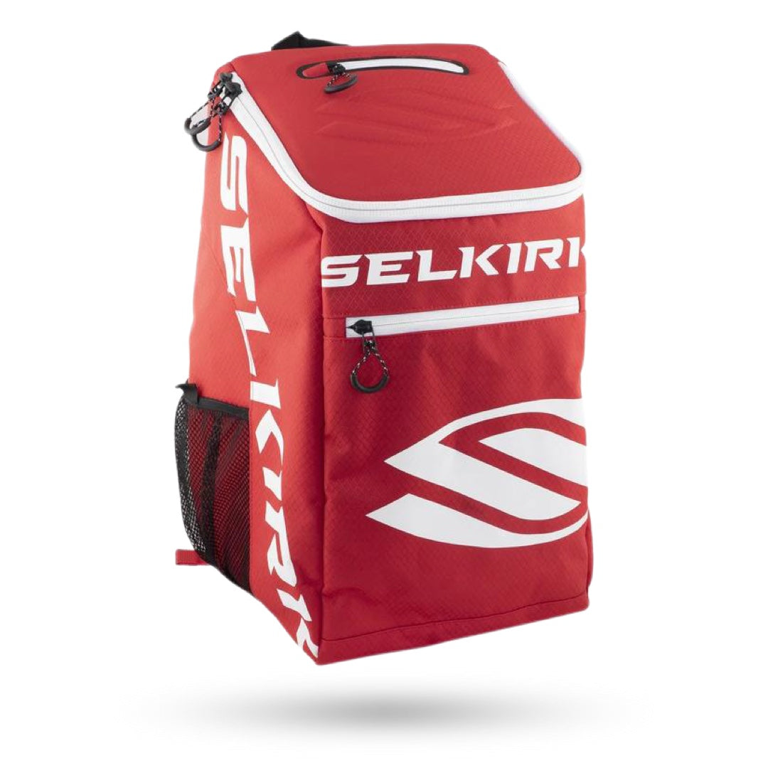 A red and white Selkirk Team Backpack (2021) Pickleball Bag with the word Selkirk on it.