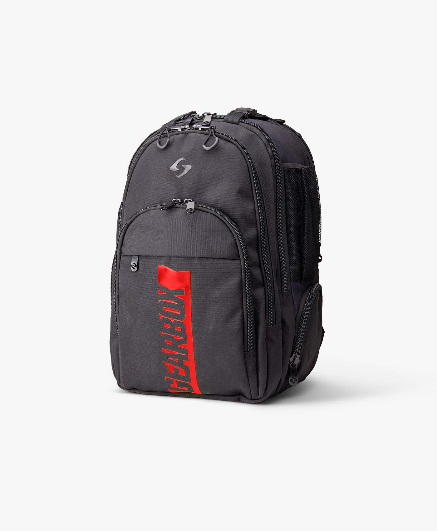 A black Gearbox Core Collection Pickleball Backpack with multiple compartments featuring a red vertical "Gearbox" logo on the front pocket, and a small white emblem near the top.