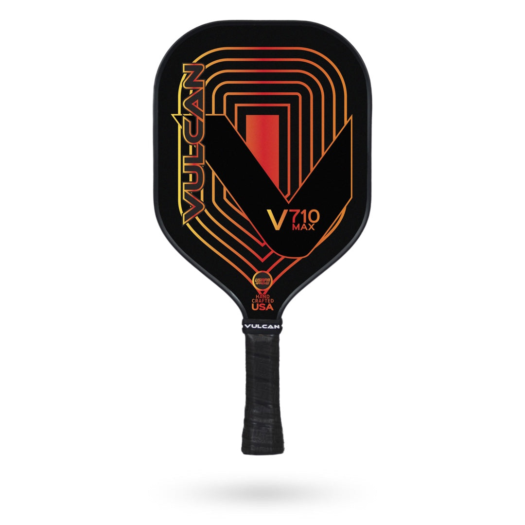 A black Vulcan V710 MAX Pickleball Paddle with red and orange geometric graphics and the brand name Vulcan printed on the face and handle, designed for maximum power.