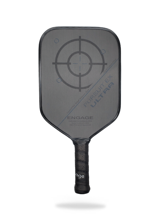 An Engage Pursuit ULTRA EX Pickleball Paddle with a target on it.
