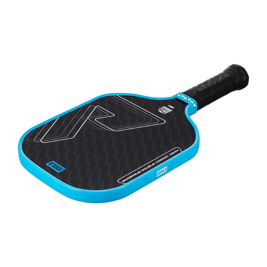 The JOOLA Double Vision Scorpeus 16mm Pickleball Paddle features a textured surface, cushioned grip, and bold black-and-blue geometric design—perfect for advanced players wanting top performance and style.