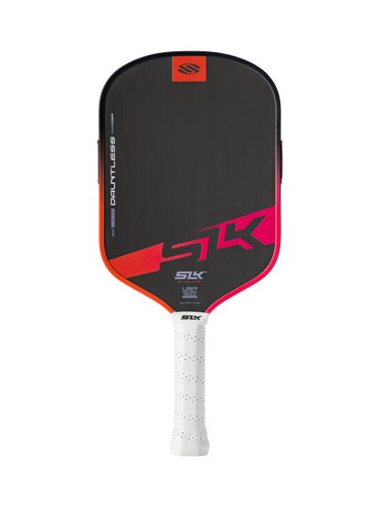 A black and red Selkirk SLK Dauntless Elongated 16mm Pickleball Paddle with a white perforated grip labeled "Dauntless" stands vertically against a plain white background.
