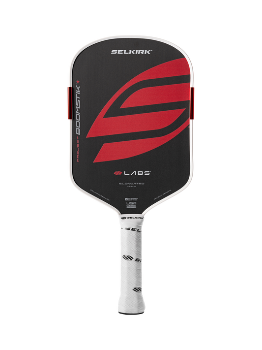 The Selkirk LABS Project Boomstik Elongated 16mm Pickleball Paddle with Infinigrit features a black design with red graphics and a white handle, photographed on a white background—ideal for players seeking advanced spin and control.