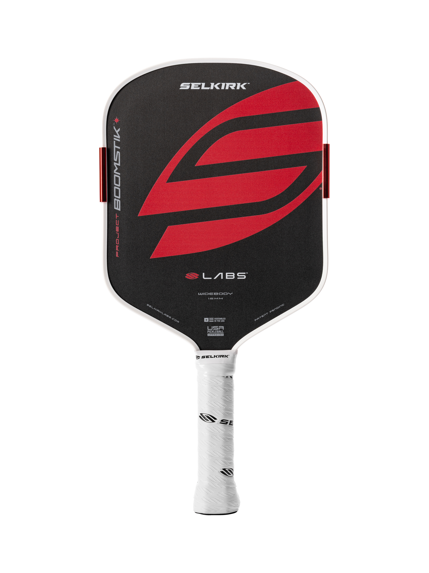 The Selkirk LABS Project Boomstik Widebody 16mm Pickleball Paddle with Infinigrit features a black and red carbon face, white edge guard, white grip, and displays the Selkirk brand name and logo.