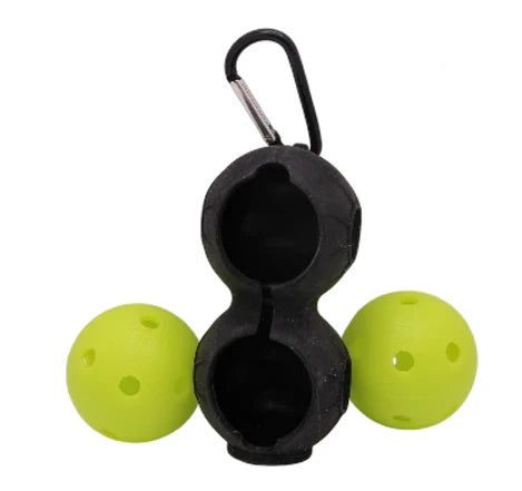The Bzer Sports BZER Mini Training Pickleball set includes two yellow mini balls and a black plastic ball bag clip with carabiner, securely holding both balls for easy transport.