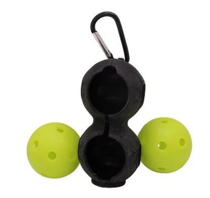 The Bzer Sports BZER Mini Training Pickleball set includes two yellow mini balls and a black plastic ball bag clip with carabiner, securely holding both balls for easy transport.