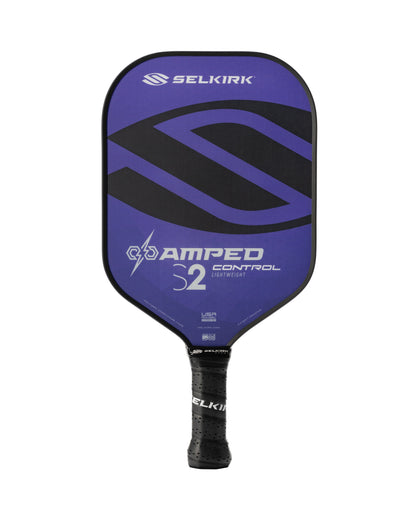 A Selkirk AMPED Control S2 16mm pickleball paddle in blue features a black handle and a large "S" design on the face.