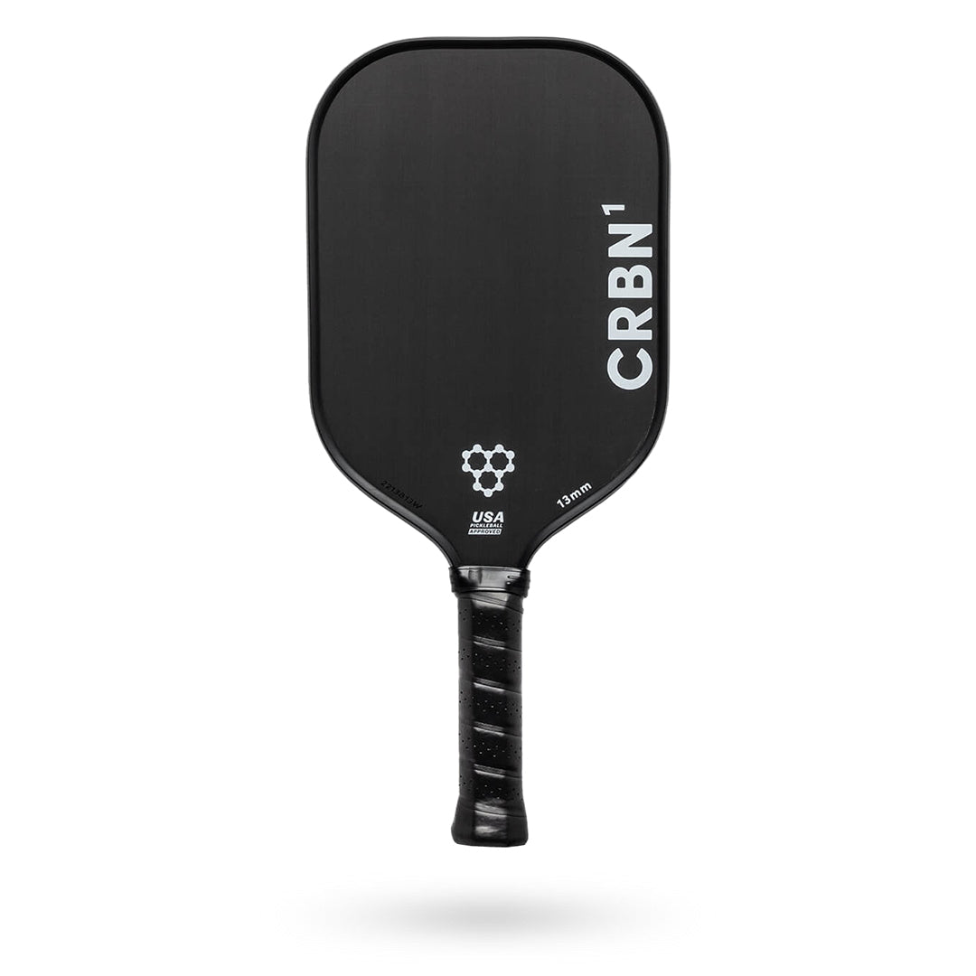 A black CRBN 1 - 13mm Pickleball Paddle with the word CRBN on it.