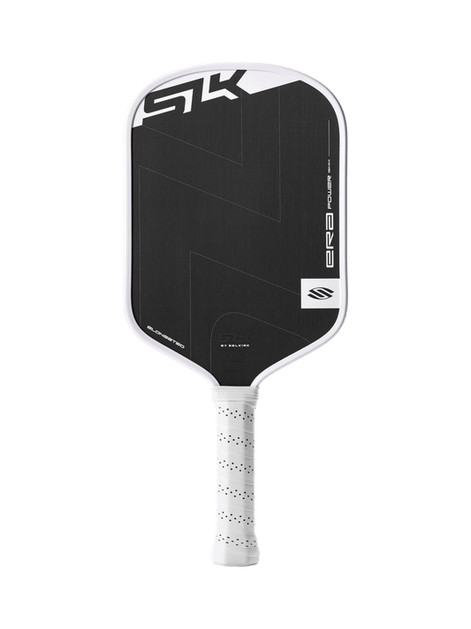 This product description features the Selkirk SLK ERA Power - Elongated, a black and white pickleball paddle with a textured surface, perforated white grip, and the Selkirk logo with “ERA” shown on the face.