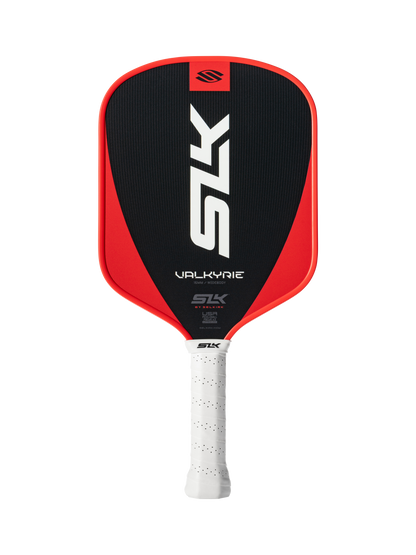The Selkirk SLK Valkyrie Widebody 16mm Pickleball Paddle features a black and red design, "SLK" and "VALKYRIE" printed on the face, and a white perforated grip handle.
