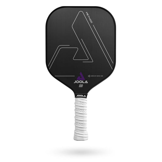 A black JOOLA Method CGS 12 Pickleball Paddle with white geometric designs, an elongated handle, and a white, Carbon Grip Surface textured handle.