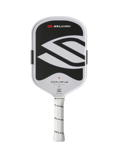 The Selkirk OMNI Elongated 16mm Pickleball Paddle features a black and white design with a large "S" logo and white grip, making it an ideal all-court paddle for versatile play.
