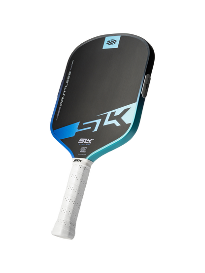 The Selkirk SLK Dauntless Widebody 16mm Pickleball Paddle, black and blue with a white grip and SK plus Selkirk logos, is displayed on a plain white background.