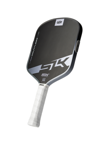 The Selkirk SLK Dauntless Widebody 16mm Pickleball Paddle features a black and gray design with a white grip, SK logo, and "Dauntless" on the face.