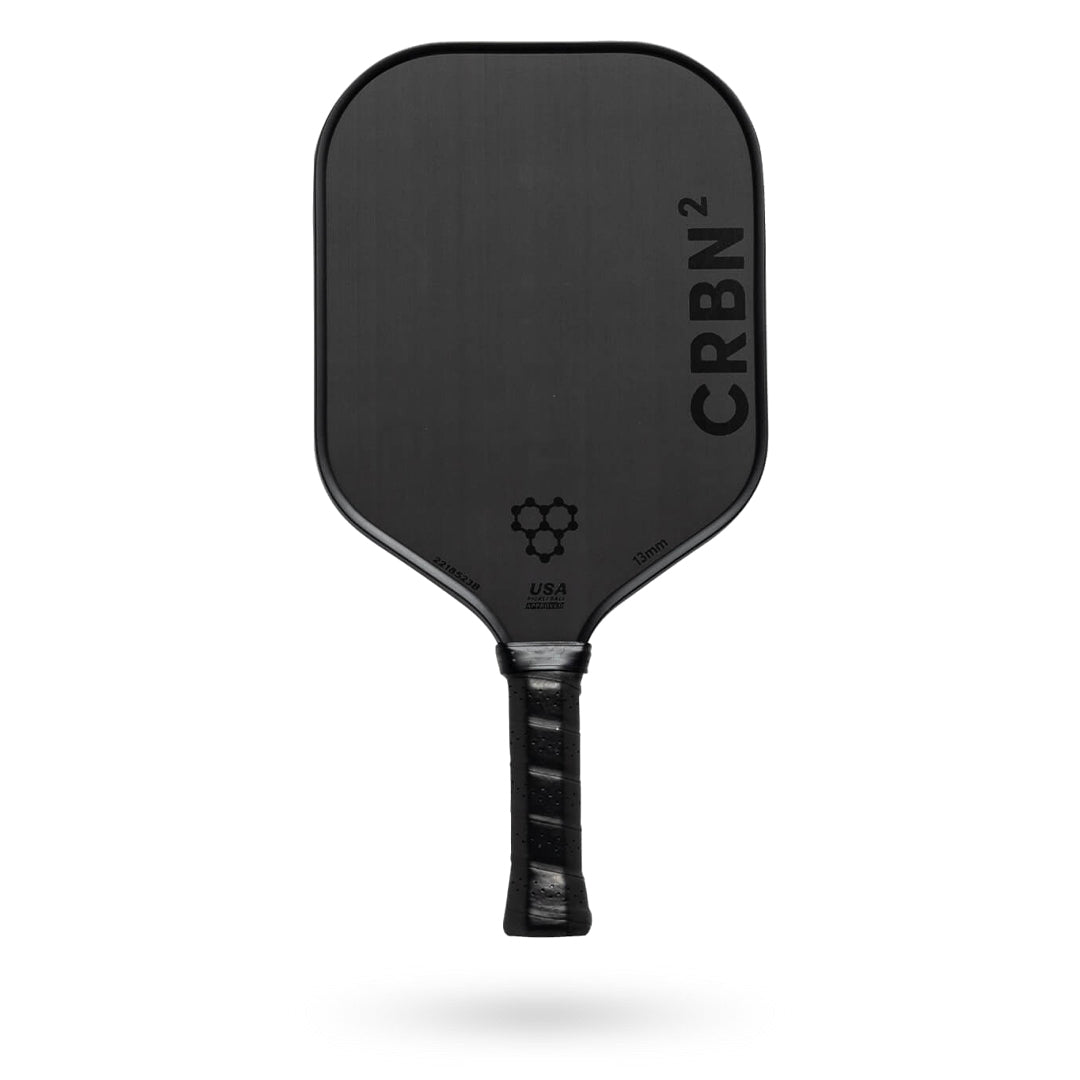 A black CRBN 2 - 13mm Pickleball Paddle with the word CRBN on it.