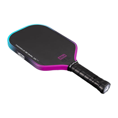 The JOOLA Perseus 3S Dual 16mm Pickleball Paddle features a black carbon fiber face, purple and teal edge, black handle, and bold JOOLA branding on both the paddle face and grip.