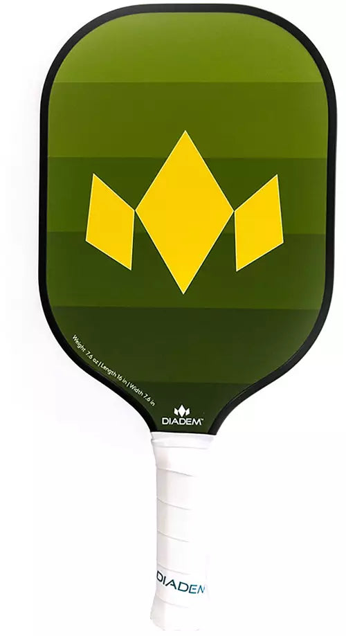 The Diadem Team Pickleball Paddle boasts a green face adorned with a yellow geometric design, complemented by a white handle and featuring the brand name "Diadem" near the bottom.