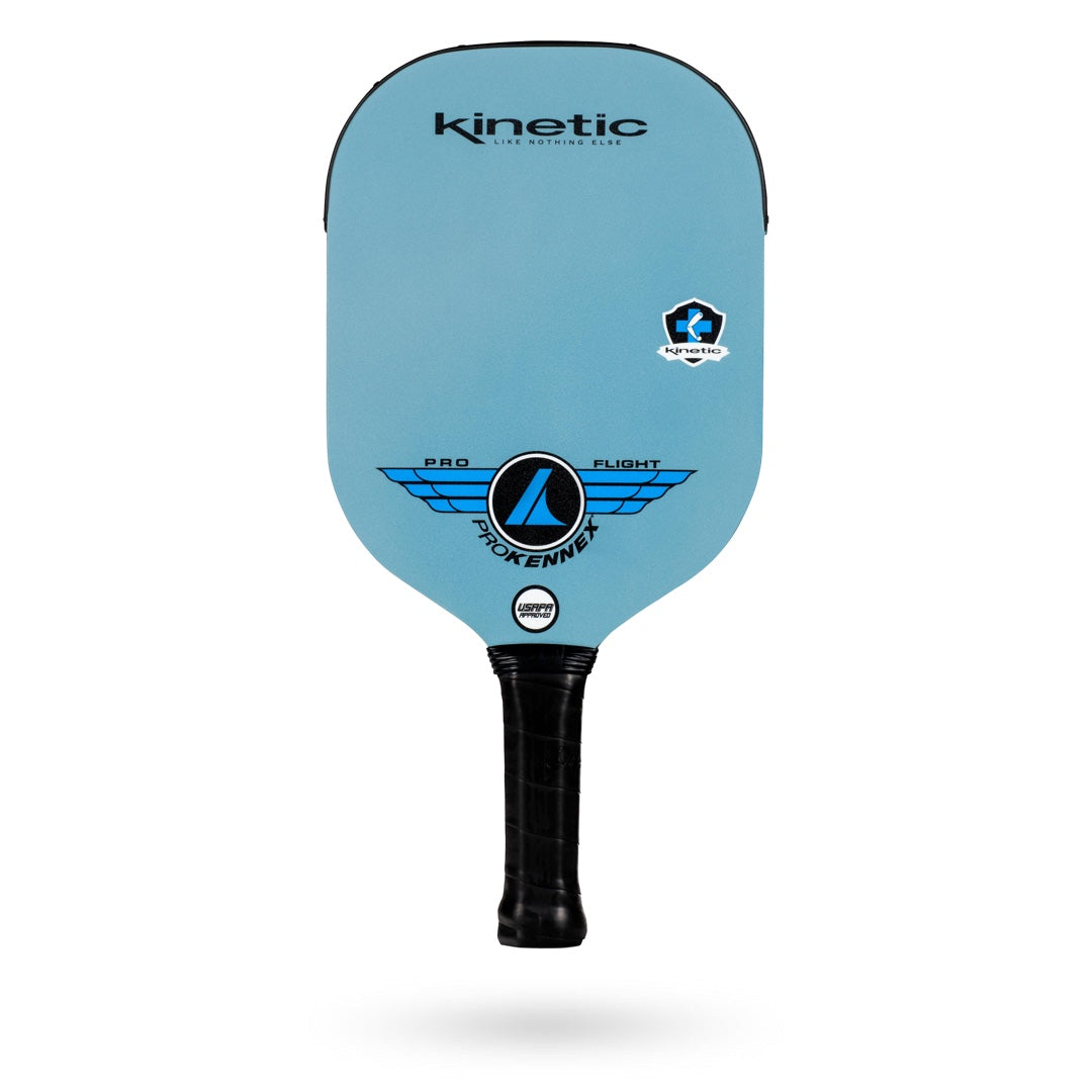 A ProKennex Kinetic Pro Flight Pickleball Paddle with a grip, featuring the ProKennex logo on it.