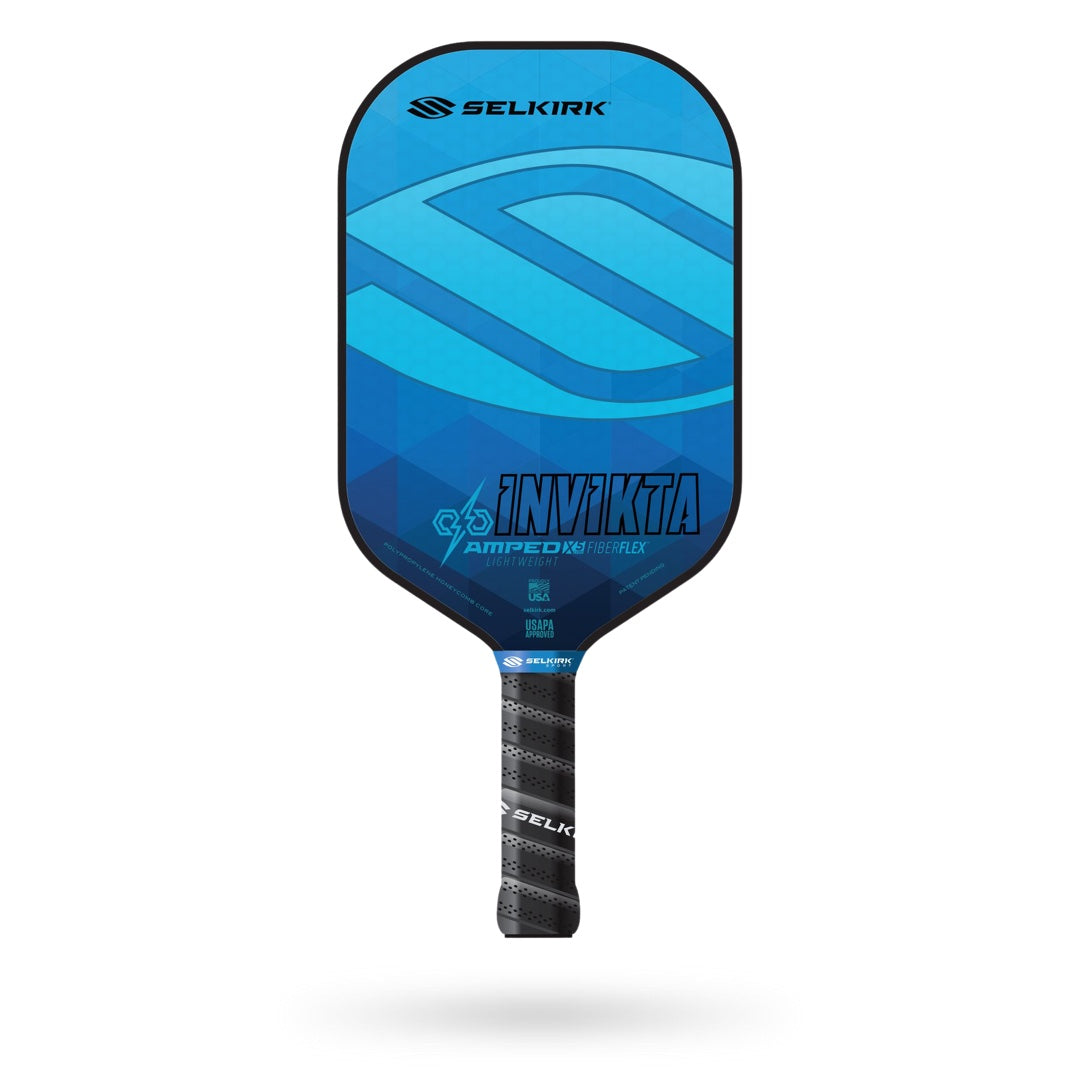 A Selkirk Amped Invikta Pickleball Paddle on a white background.