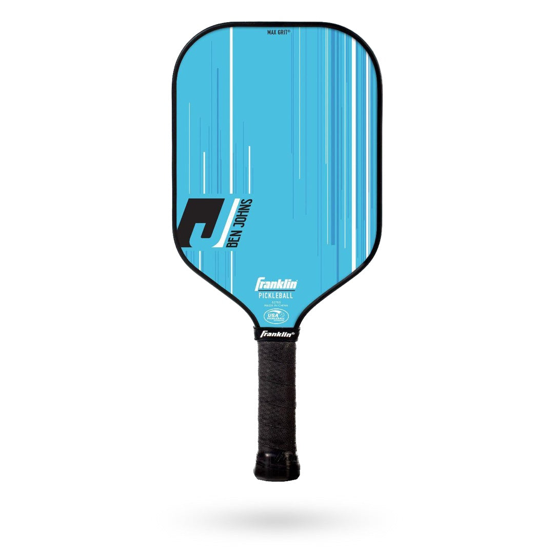 A blue paddle with a black and white design.